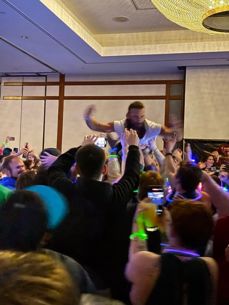 Zach crowdsurfing